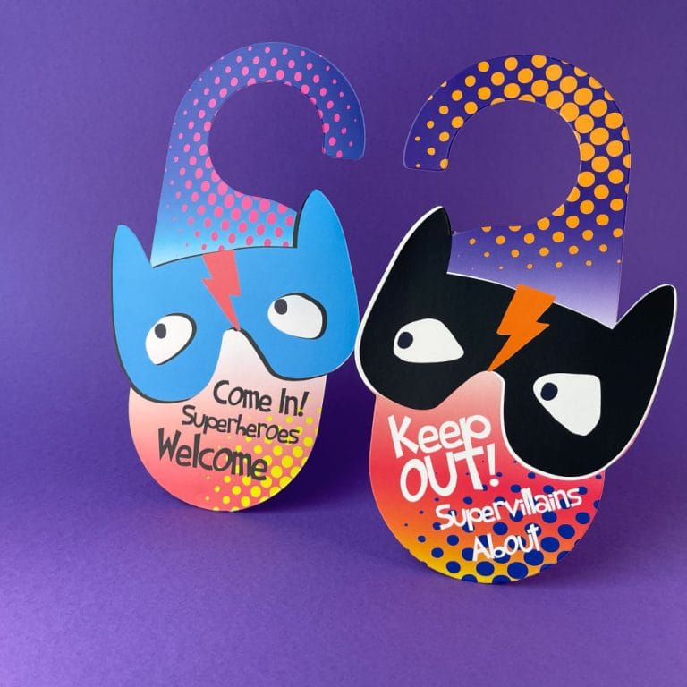 Double-sided cardboard superhero door hanger with 'Come in, Superheroes, Welcome' and 'Keep Out, Super Villains About' text; a plastic-free party bag filler