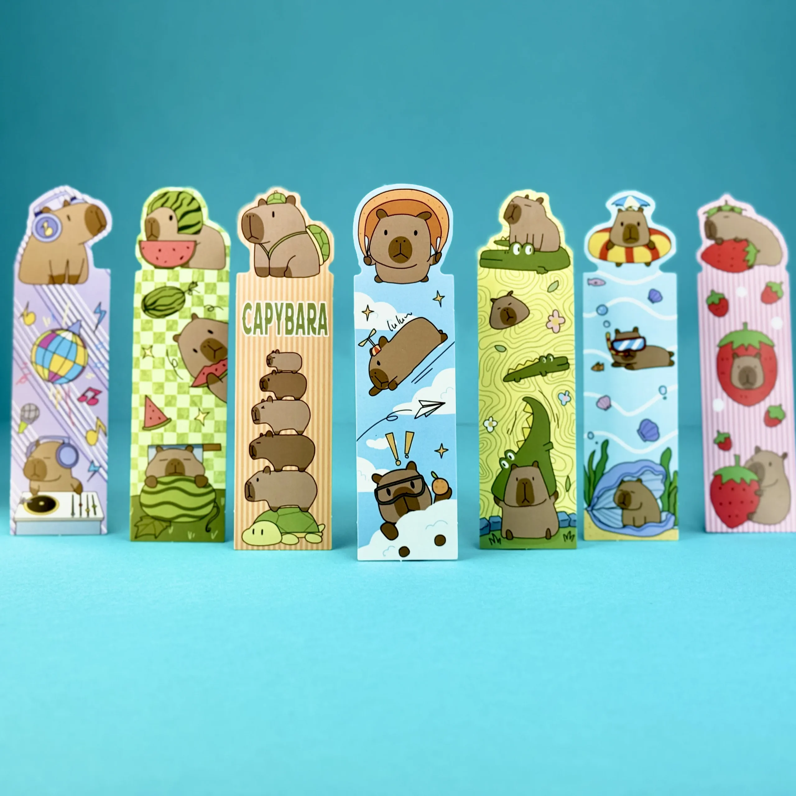 Seven designs of Capybara bookmarks for party bag fillers